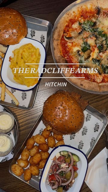 A promotional montage showcasing the interior, exterior, menu, and food offerings of The Radcliffe Arms, a pub and restaurant venue. The video highlights the dining area, bar, and various dishes.