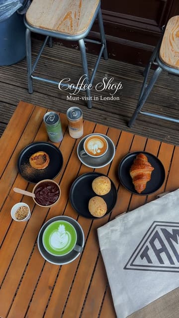 A short, aesthetic montage showcasing a cafe in Chiswick, featuring close-ups of coffee, pastries, and Brazilian cheese bread, along with shots of the cafe's interior and exterior.