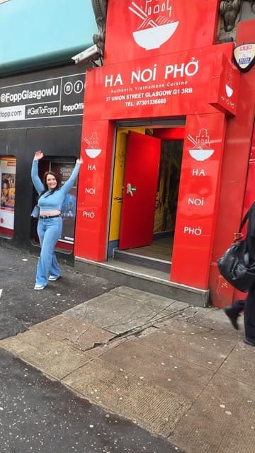 A 'come with me' style vlog featuring a visit to Ha Noi Pho in Glasgow, showcasing the interior, menu, and various Vietnamese dishes including summer rolls, fish cakes, Peking duck hot pan, and stir-fried pho.