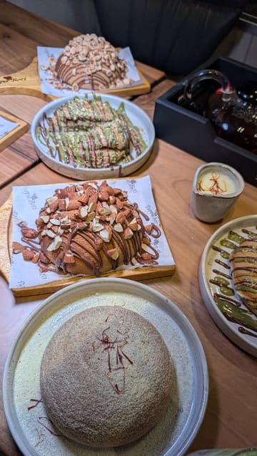 A short video showcasing the menu at Pappa Roti in Blackburn, featuring their signature buns with various toppings and a selection of hot and cold beverages.