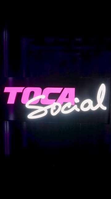 A creator visits Toca Social in Westfield, showcasing the interactive football games and trying the brisket sandwich.