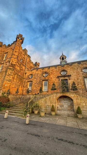 A comprehensive tour of Lumley Castle, showcasing the historic architecture, the unique 'Castle Feature Room' with its hidden en-suite, the cozy Library Bar, and a three-course dinner in the Knights Restaurant, followed by a breakfast spread.