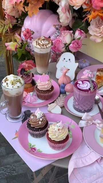 A montage of Halloween-themed cupcakes, cookies, and lattes at Peggy Porschen, showcasing the seasonal menu and aesthetic decor.