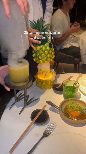 A high-quality montage showcasing the dining experience at Amazónico, featuring a variety of dishes, cocktails, live music, and the venue's distinctive jungle-themed interior.