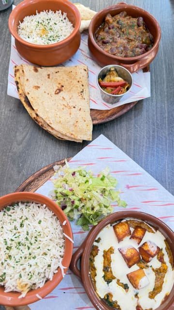 A short, handheld video showcasing the student menu deals at My Karak Chai in Middlesbrough, featuring close-ups of the food and the menu board.