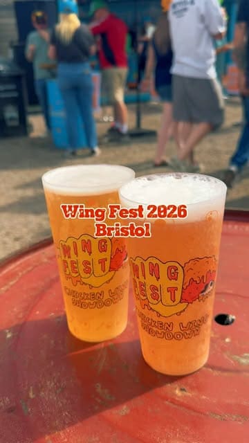 A fast-paced, energetic montage capturing the atmosphere, food, and entertainment at Wing Fest in Bristol, featuring various chicken wing vendors and live music.