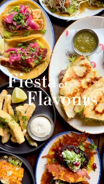 A fast-paced, visually appealing montage showcasing a variety of Mexican dishes including tacos, quesadillas, and corn ribs, alongside cocktails at Lobo Rojo in Gosforth. The video highlights the vibrant presentation of the food and provides a brief look at the restaurant's interior and exterior.