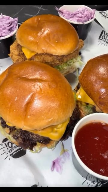 A short, energetic montage showcasing the food preparation and final presentation at a Burger Boi location, featuring smash burgers, loaded fries, and churros.