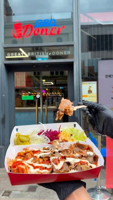A promotional video for Great British Doner in Manchester, highlighting their robot-cut doner kebab preparation, including the assembly of wraps and boxes, and showcasing the venue's exterior.
