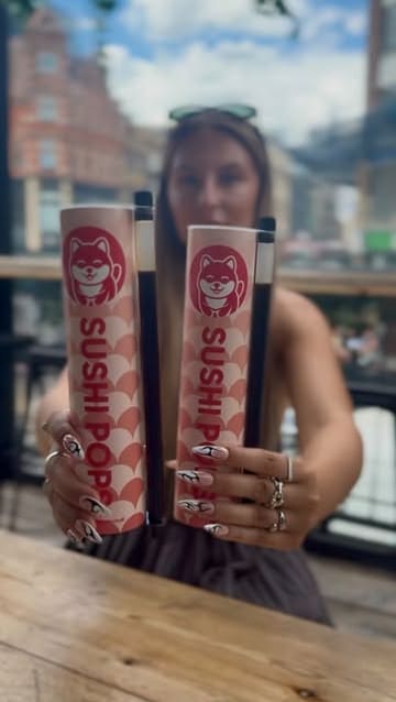 A short, energetic video showcasing a visit to Sushi Pops at Boxpark Shoreditch, highlighting the unique tube-based sushi concept, the ordering process via kiosk, and the final product.