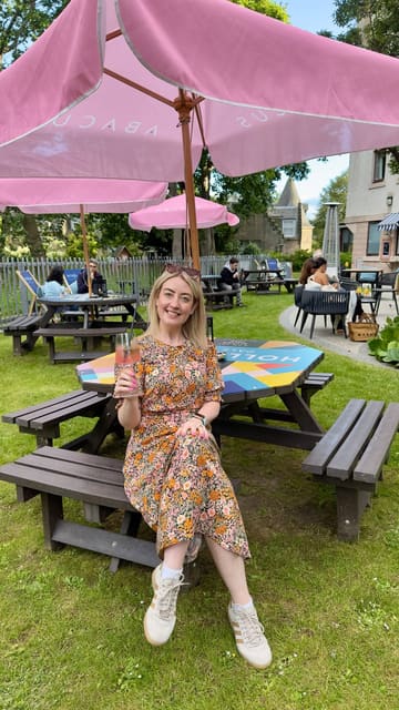A vlog-style reel showcasing the 'Summer Sessions' at The Scholar Hotel in Edinburgh. The video highlights the garden terrace, live music, cocktails, and food offerings like tacos and sliders, while also mentioning the dog-friendly policy and the coffee hatch.