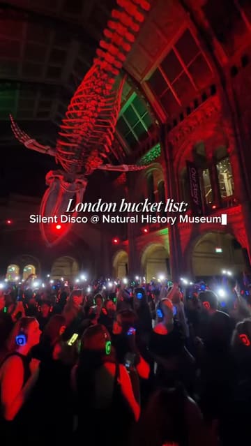 A short, energetic reel showcasing a silent disco event held inside the Natural History Museum in London. The video features clips of attendees dancing with headphones in the main hall under the iconic whale skeleton, capturing the lively atmosphere of the event.