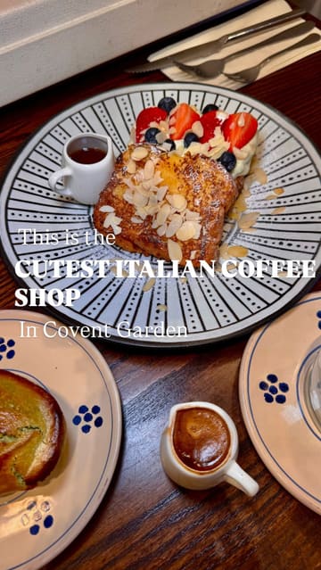 A short, aesthetic montage showcasing the interior and food offerings of an Italian cafe in London. The video features close-up shots of brunch dishes like eggs benedict, salmon toast, and French toast, as well as coffee preparation and a display of pastries.