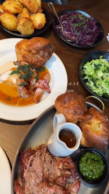A short, aesthetic montage of a Sunday roast meal at Pasture in Birmingham, featuring close-ups of roast chicken, lamb shoulder, and various sides with gravy being poured.