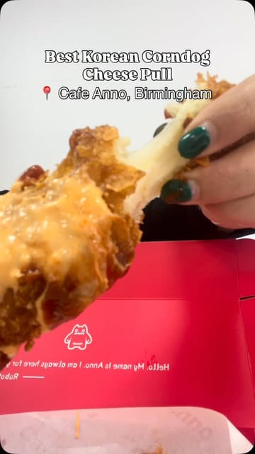 A short promotional video for Cafe Anno in Birmingham, highlighting their Korean corndogs, chicken and waffles, and bubble tea, while also showcasing the venue's casual seating and gaming area.