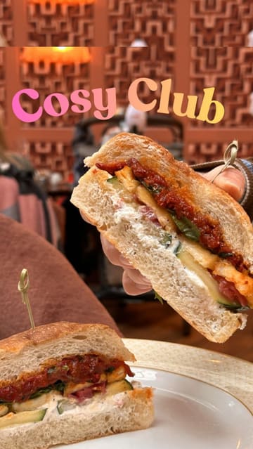 A review of the new spring menu at Cosy Club in Manchester, featuring a variety of dishes including small plates, sandwiches, and desserts. The creator highlights specific items like the hot honey halloumi focaccia, arancini, and the brûléed miso caramel tart.