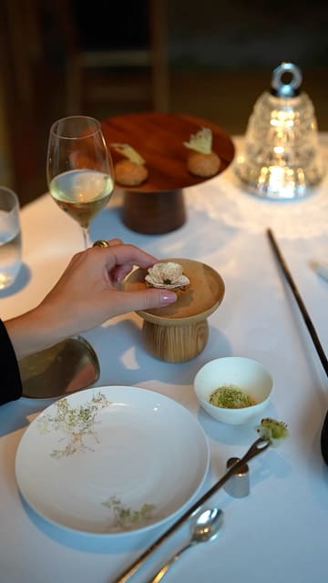 A cinematic montage showcasing a multi-course fine dining experience at Alain Ducasse at The Dorchester, highlighting intricate plating, professional service, and high-quality ingredients.