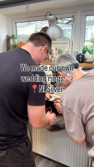 A montage video showing a couple participating in a jewelry-making workshop to create their own wedding rings. The video captures various stages of the process, including filing, hammering, and soldering, set to music with text overlays explaining the activity.