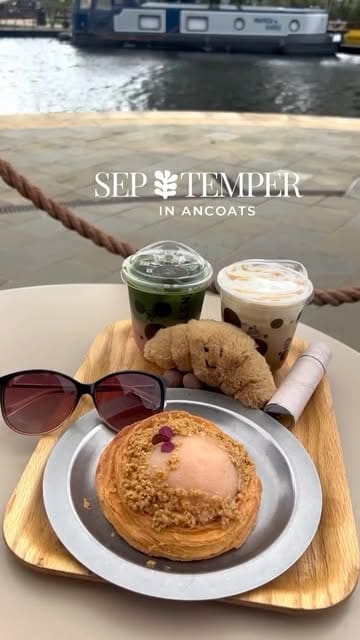 A short, aesthetic reel featuring a walk along the canal in Ancoats, Manchester, followed by visits to Pollen Bakery and Mielle Patisserie. The video highlights the scenic location and the visually appealing pastries and drinks on offer.