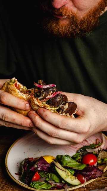 A behind-the-scenes look at a professional food photography shoot at Copper and Moss cafe, featuring high-contrast, flash-lit images of various brunch dishes and drinks.
