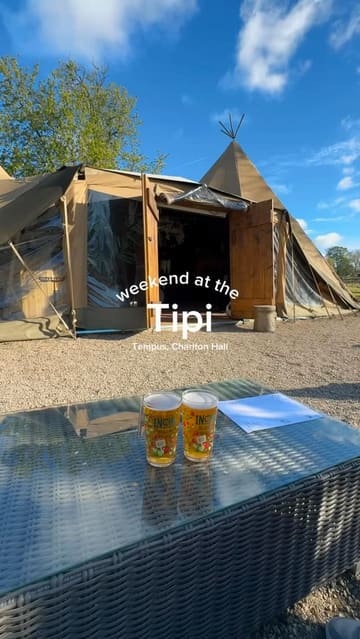 A montage video showcasing a tipi venue located on an estate, highlighting the outdoor seating, interior decor, wood-fired pizza, cocktails, and live music.