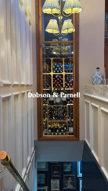 A montage video showcasing the refurbished interior and new small plates menu at Dobson & Parnell in Newcastle. The video features shots of the dining room, wine display, and various plated dishes.