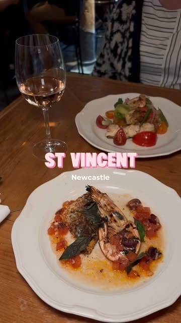 A short montage showcasing the exterior, wine selection, and various dishes at St. Vincent in Newcastle.