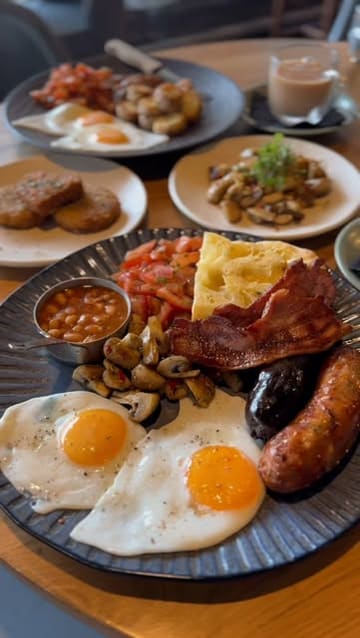 A promotional reel showcasing a new weekend brunch menu at Cafe Fiesta, featuring a variety of Argentinian-inspired breakfast dishes and the venue's interior and outdoor seating area.