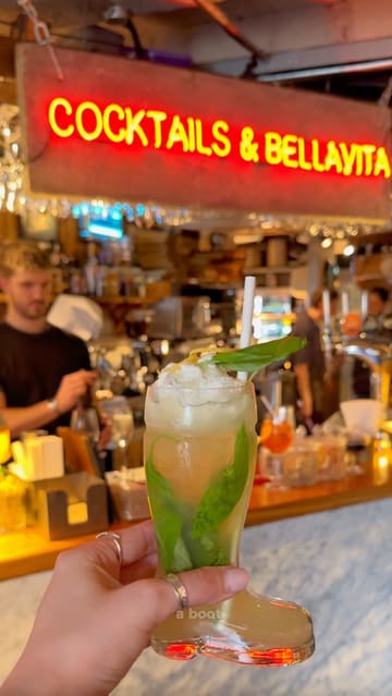 A fast-paced, engaging review of an Italian restaurant in Leeds called Livin' Italy, showcasing cocktail preparation, pizza and pasta dishes, and the venue's cozy atmosphere.