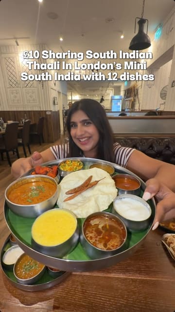 A video review of a South Indian restaurant in East Ham, London, highlighting their affordable weekday thali deals and a variety of authentic dishes like curries, parotta, and grilled items.