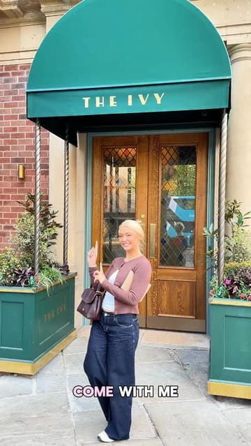 A creator visits the newly opened The Ivy in Chester to celebrate a 90th birthday. The video provides a tour of the restaurant's interior, highlights the outdoor terrace, showcases various dishes and drinks, and mentions the value of their set menu offer.