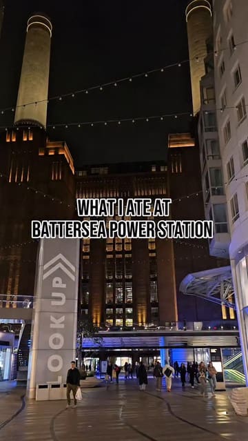 The creator visits Battersea Power Station to sample food from various vendors, including Arabica, Gracey's Pizza, Manna Burgers, and Solis. The video features the creator walking through the venue, showing the food preparation, and providing honest reviews of the dishes, highlighting the pizza, burger, and basque cheesecake.
