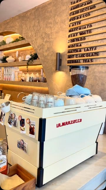 A montage showcasing the interior, coffee, and brunch dishes at a cafe called Touché.