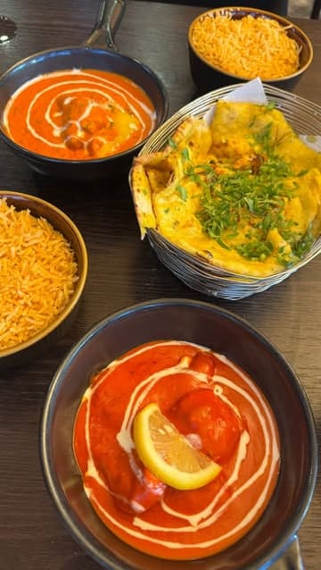 A review-style reel showcasing a pre-theatre menu at The Osprey in East Kilbride, featuring various Indian dishes and a dessert.