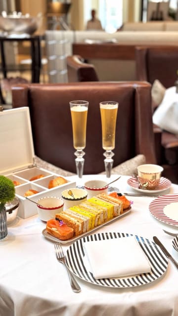 A montage showcasing an afternoon tea service at the Corinthia London, highlighting the elegant floral decor, the tiered serving stand, and the various pastries and sandwiches included in the experience.