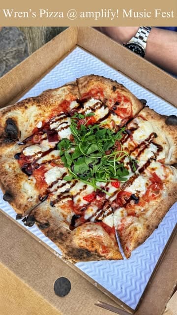 A promotional video for Wren's Pizza, a family-run mobile pizza pop-up, showcasing their new trailer, the pizza-making process, and the finished product.