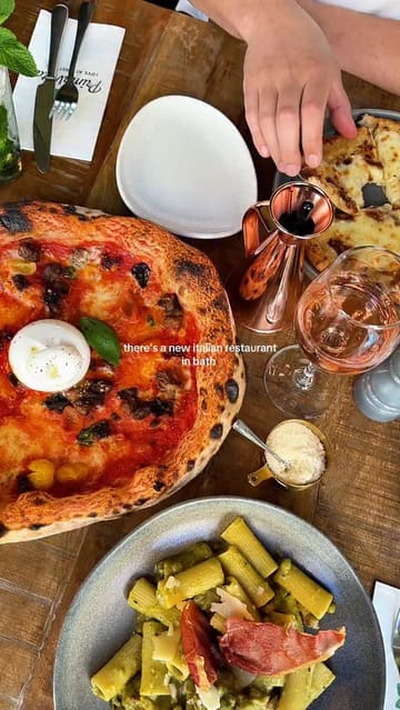 A promotional reel for PrimaVista in Bath, featuring a variety of Italian dishes including pizza, pasta, bruschetta, and desserts, alongside cocktails. The video uses quick, rhythmic cuts to showcase the food and the restaurant's interior decor.