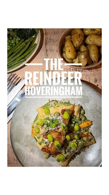 A montage video showcasing the interior, exterior, and menu offerings of The Reindeer pub. The video focuses on the cosy atmosphere and high-quality food presentation, featuring dishes like crab on crumpet, lamb, and halibut, alongside espresso martinis.