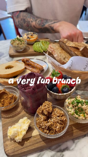 A vlog-style review of a cafe in Sheffield that uses a 'tick sheet' ordering system for a Copenhagen-inspired brunch. The creator showcases the menu, the food, and the overall experience, including a visit to a nearby park.