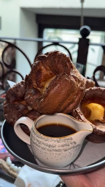 A couple visits The Botanist in Chester to try their bottomless Yorkshire pudding and gravy Sunday roast offer. The video follows their experience from arrival to eating, highlighting the food and the atmosphere.