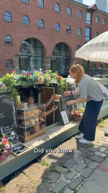 A creator-led vlog showcasing a walk through the Castlefield area of Manchester, highlighting a floating coffee boat and a waterside restaurant called The Wharf.