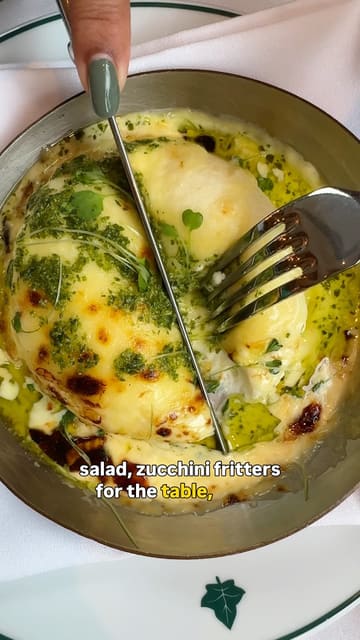 The video features a creator visiting The Ivy on Dawson Street to review their 'Taste of Ireland' set menu. It includes shots of the restaurant's interior, the menu, and various dishes including drinks, starters, mains, and desserts.