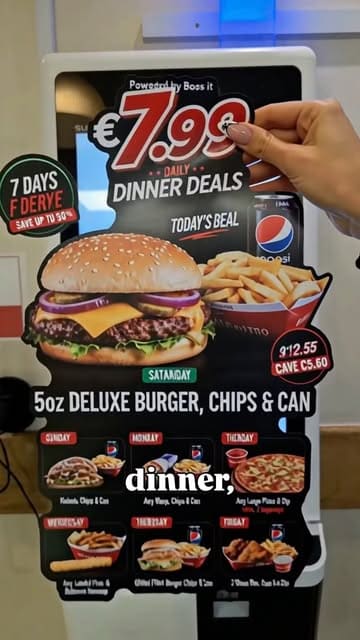 A creator visits Romayo's to showcase their daily €7.99 dinner deals, demonstrating the ordering process at a kiosk and reviewing the food options available throughout the week.