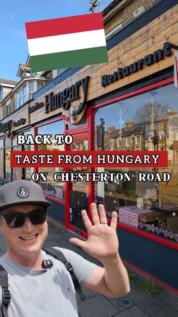 A vlog-style review of a Hungarian restaurant in Cambridge, showcasing the venue's unique decor, history, and a variety of traditional dishes including lángos, wild boar stew, chicken paprikash, and a large sharing platter.