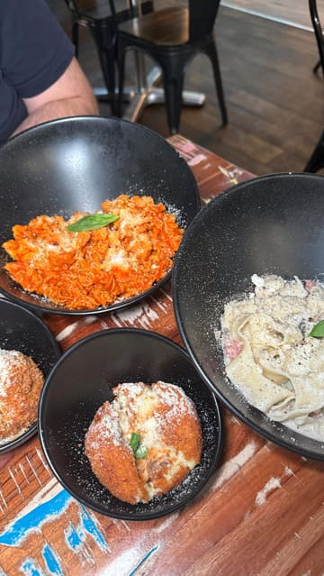 A short, engaging review of Pasticcio on Byres Road, highlighting their fresh, customizable pasta dishes, arancini, and tiramisu. The video features close-up shots of the food, a look at the menu, and the restaurant's interior, while mentioning a lunch deal and BYOB policy.