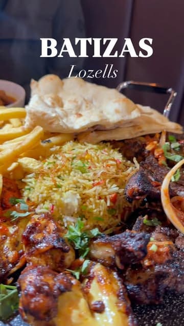 A promotional video for Batizas in Lozells, Birmingham, featuring a montage of their new menu items including tawa, masala fish, curries, and mocktails, alongside shots of the venue's branding.