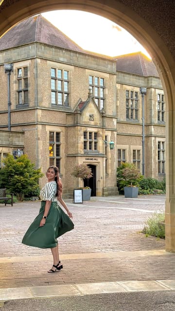 A cinematic montage showcasing a stay at Fanhams Hall, a country house hotel. The video highlights the historic architecture, extensive gardens, comfortable bedroom, and dining experiences including afternoon tea and dinner.