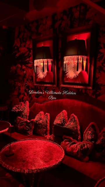 A short, aesthetic montage showcasing the interior and atmosphere of a hidden bar in London. The video features slow-motion shots of the plush, red-lit seating areas, signature cocktails, and small plates of food, set to music.
