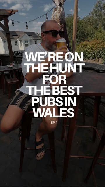A couple visits The Gwaelod y Garth Inn near Cardiff as part of a series exploring the best pubs in Wales, highlighting the atmosphere, beer selection, and dog-friendly nature.