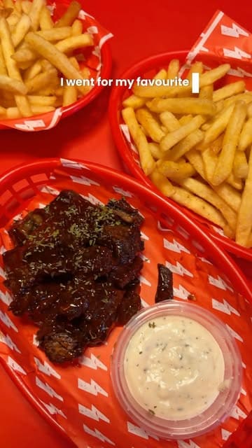 A short, punchy review of Thunder Dog, a diner-style venue in Glasgow. The video provides a quick tour of the interior, highlights the menu, and showcases specific dishes like beef brisket bites and a smash burger.